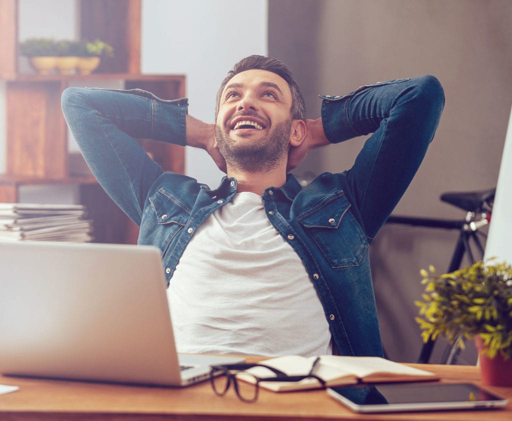 man-smiling-after-applying-for-debt-consolidation-loan