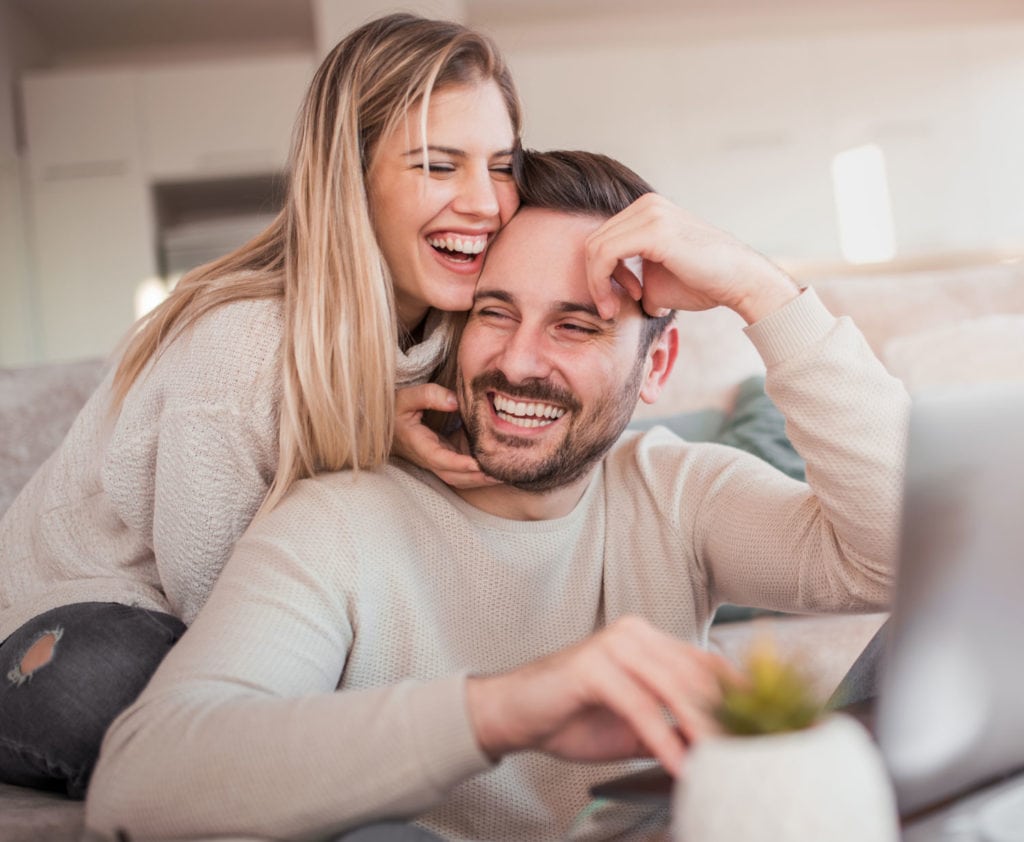 happy-couple-applying-for-second-mortgage