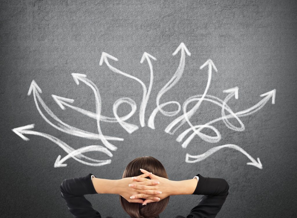 arrows drawn on a chalk board